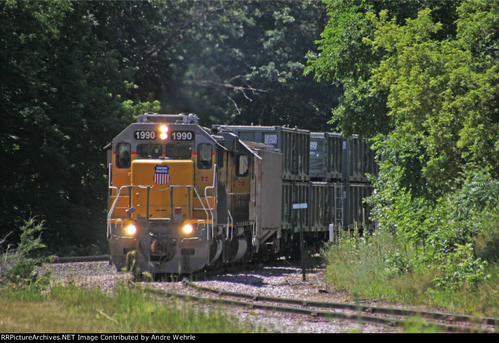 UP 1990 leads LTA-42 around the curve off the CP and onto the Winona Sub